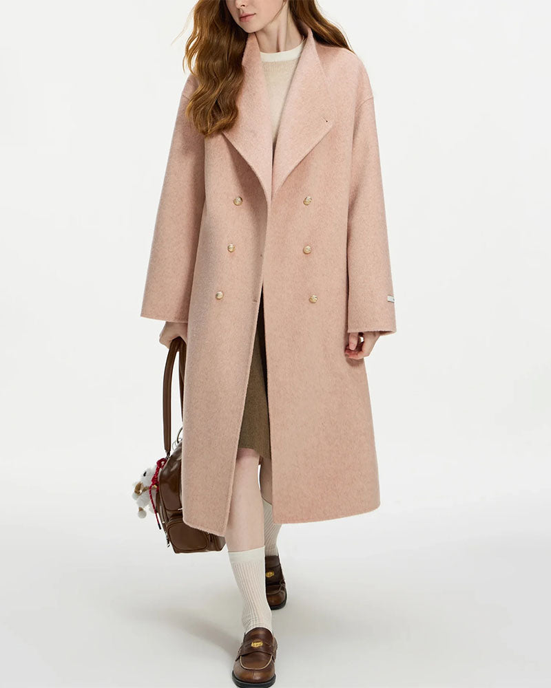 Man in knee-length camel Ulster coat crafted from pure merino wool, eight-button front blocks city chill while martingale back shapes a refined silhouette.