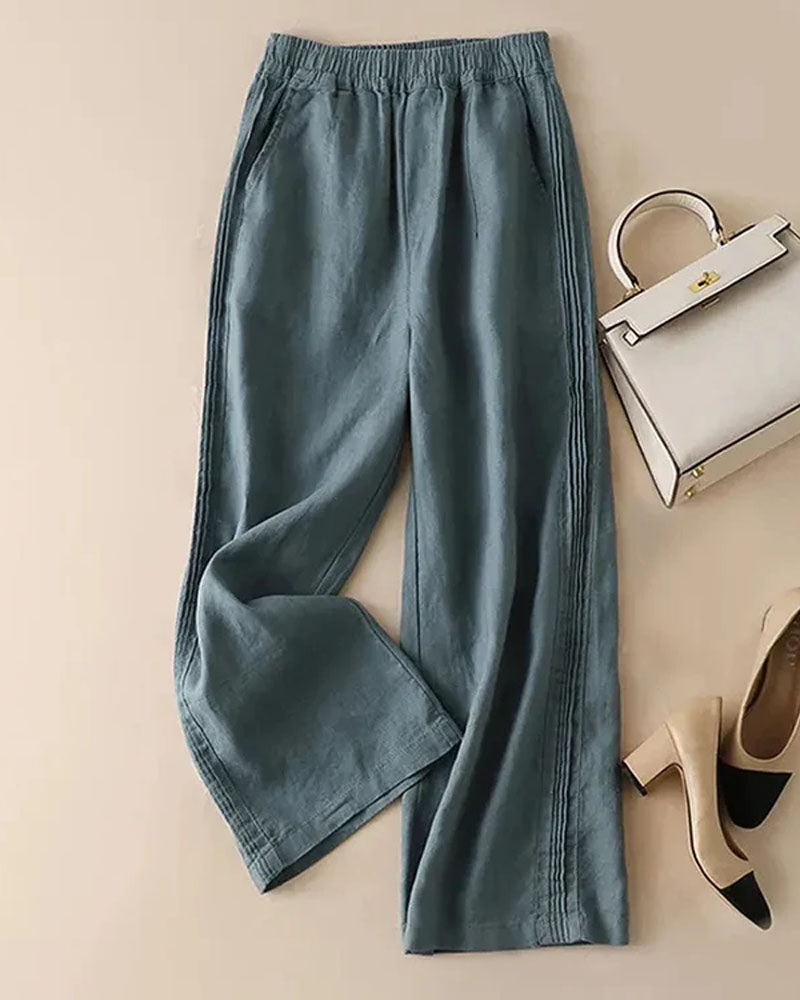 Woman brunching in Cotton-Linen Blended Wide-Leg Trousers, airy 55 % linen / 45 % cotton weave keeps you cool—your breathable 70-85 °F summer staple