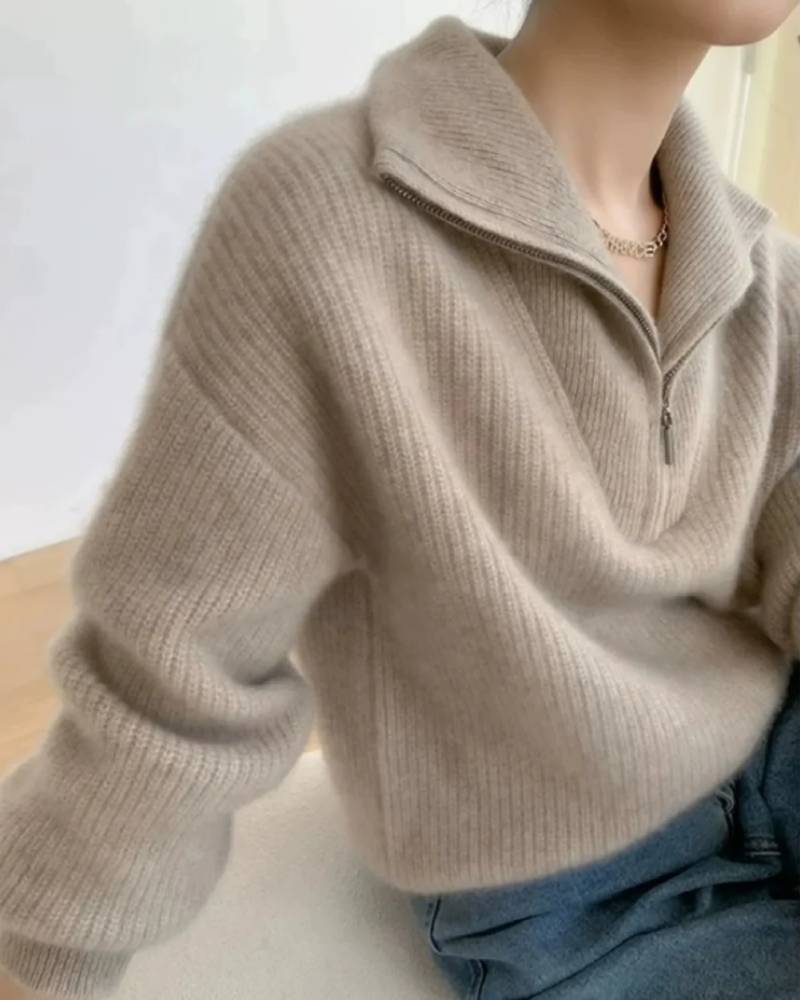 Oversized Cashmere Pullover, large fold-over lapel, asymmetrical two-way zip, midi length, deep-sea navy—runway-ready winter layer that belts over denim or leggings.