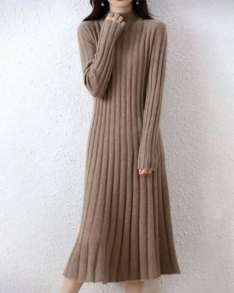 Woman posing in a ribbed-knitted 100 % wool sweater dress, camel 19-micron Merino fibers and midi-length rib contour curves while locking in warmth—your luxe yet breathable 35-55 °F fall-through-spring statement.