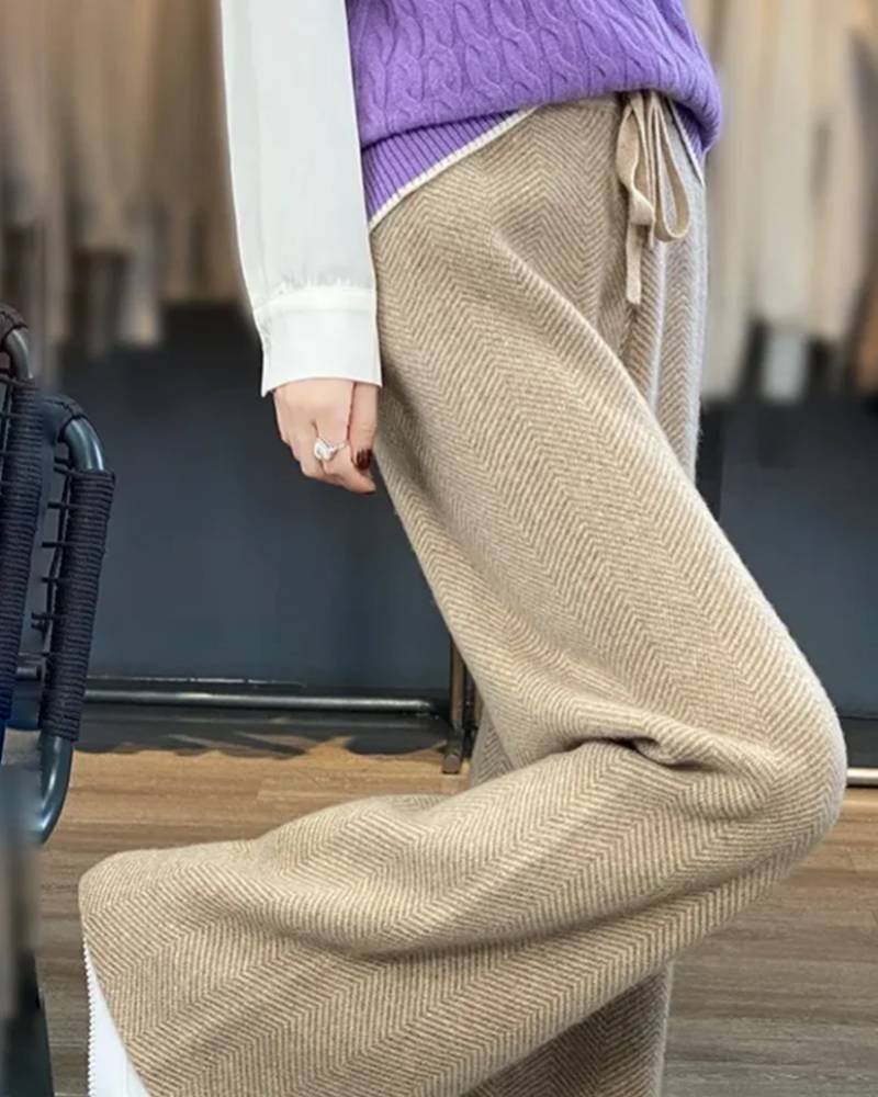 Gentle Herd wide-leg wool pants, merino knit, elastic high waist, ankle-grazing length, heather taupe—cloud-soft warmth for winter lounging or city outings.