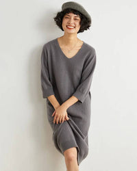 100 % cashmere half-sleeve sweater dress, relaxed A-line cut, midi length, soft camel—luxury warmth for spring brunches or layered winter office looks.