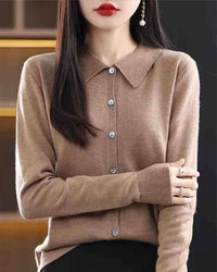 Woman layering the Basic Wool Shirt Cardigan, 100 % superfine Merino and shirt-style lapels give nautical polish—your wind-proof 45-65 °F fall-through-spring essential.