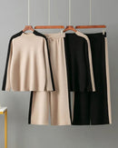 Woman lounging in a sand-beige basics color-block casual set, soft cotton-jersey crop top and joggers give effortless weekend comfort—perfect 65-75 °F spring-fall loungewear.