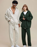  Woman layering a sand-beige casual zip-up cotton hoodie, 65 % cotton / 35 % polyester fleece keeps you cozy at 60-75 °F—perfect spring-fall commuter layer.