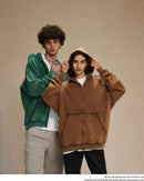 Oversized distressed hoodie featuring hand-dyed batik swirls, washed for a vintage fade—perfect men’s layer for campus or concert nights.