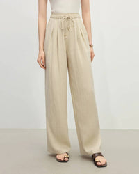 Lightweight linen high-waist trousers, elastic waistband, perfect for warm-weather layering