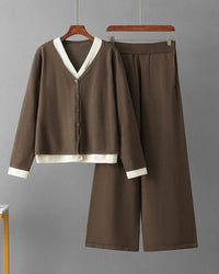 Woman brunching in a Long-Sleeve V-Neck Sweater & Wide-Legs Pants set, airy 55 % wool / 45 % viscose rib drapes like jersey—your cozy yet polished 60-75 °F spring-fall statement.