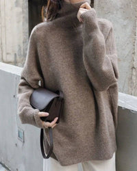 Gentle Herd slouchy  81%-90% wool turtleneck sweater, oversized drop shoulders, ribbed high neck, heather taupe—cloud-soft winter warmth for him or her.