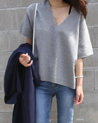 20% Wool 50% Polyester 30% Viscose V-neck short-sleeve pullover, relaxed fit, ribbed cuffs, heather taupe—breathable warmth for spring-to-fall layering or solo wear.